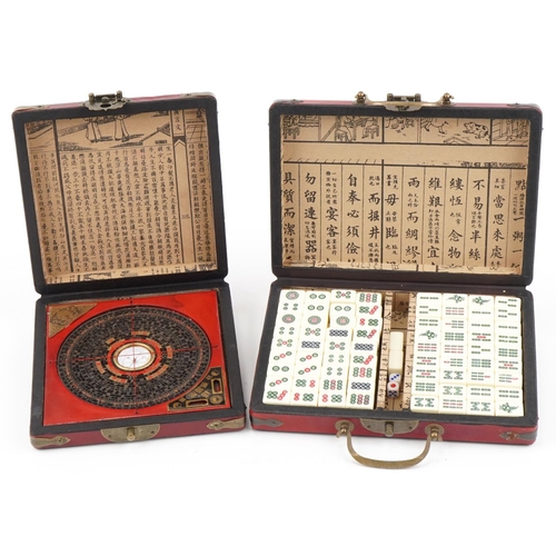 2182 - Chinese Mahjong game and astrological compass, each housed in a red lacquer fitted case, the largest... 