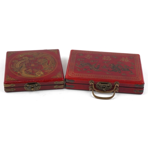 2182 - Chinese Mahjong game and astrological compass, each housed in a red lacquer fitted case, the largest... 