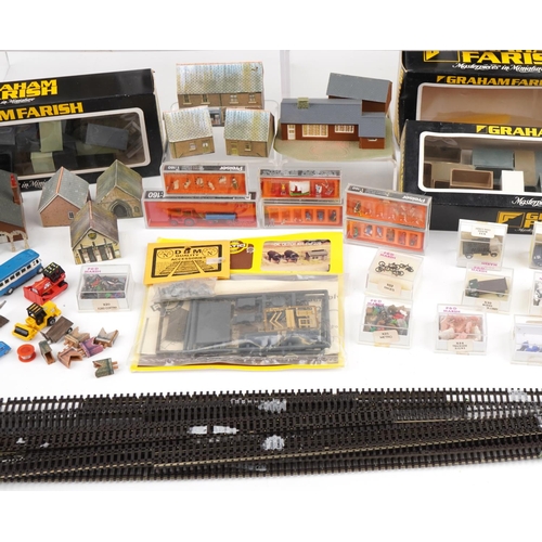 2343 - Large collection of N gauge model railway trackside accessories including buildings, figures and ani... 