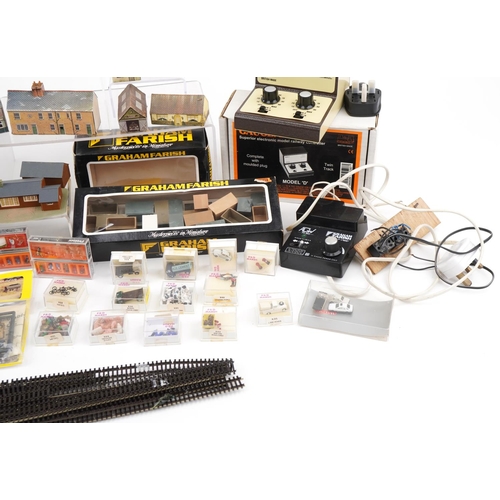 2343 - Large collection of N gauge model railway trackside accessories including buildings, figures and ani... 