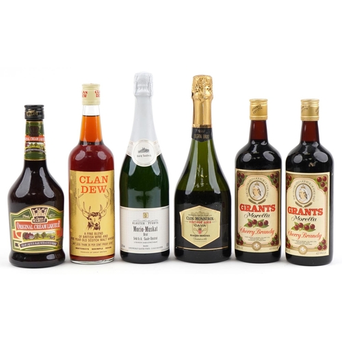 2082 - Six bottles of alcohol including Clos Monistrol vintage 2003 cava, Morio-Muskat Brut, Clan Dew Five ... 