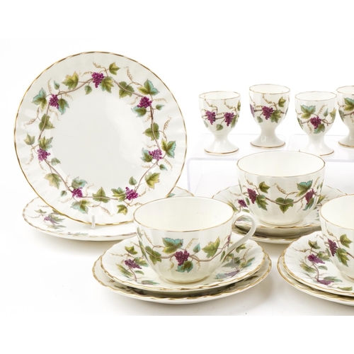 2134 - Royal Worcester Bacchanal teaware including milk jug, trios and eggcups, the jug 14cm high