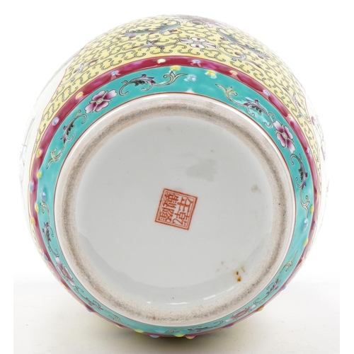 1354 - Chinese porcelain barrel shaped jar and cover hand painted with a female and child, 21cm high