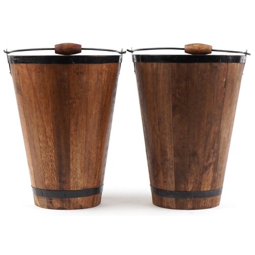 2252 - Pair of Bollinger Champagne hardwood ice buckets with metal mounts and swing handles, 40cm high excl... 