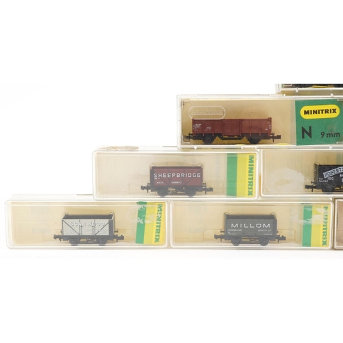 2337 - Fourteen Minitrix N gauge model railway wagons and containers with cases