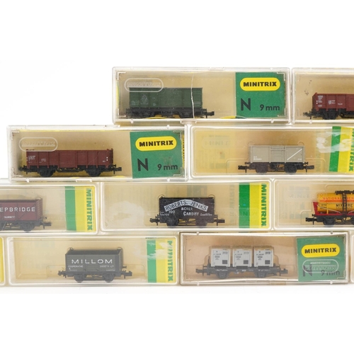 2337 - Fourteen Minitrix N gauge model railway wagons and containers with cases