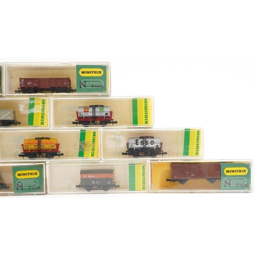 2337 - Fourteen Minitrix N gauge model railway wagons and containers with cases