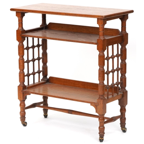 558 - Early 20th century Arts & Crafts oak three tier library book stand retailed by Liberty's of London, ... 