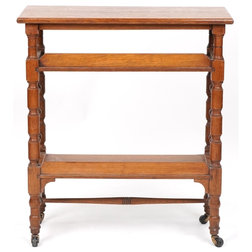 558 - Early 20th century Arts & Crafts oak three tier library book stand retailed by Liberty's of London, ... 