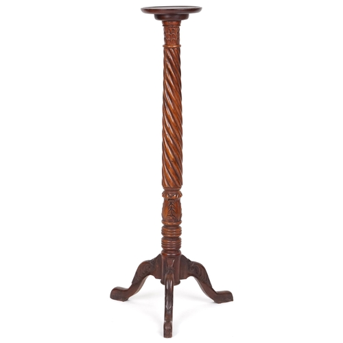 729 - Late 20th century hardwood torchère stand, 138cm high