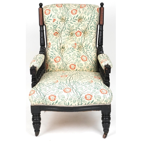 686 - Late Victorian walnut and ebonised gentleman's salon armchair upholstered in floral fabric, 96cm H x... 