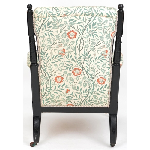 686 - Late Victorian walnut and ebonised gentleman's salon armchair upholstered in floral fabric, 96cm H x... 