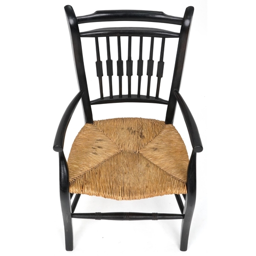 637 - 20th century Arts and Crafts ebonised child's chair with rush seat, 71cm H x 40cm W x 37cm D