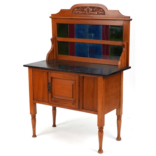 560 - Early 20th century walnut washstand with a tiled shelf back and black marble top, 128cm H x 92cm W x... 