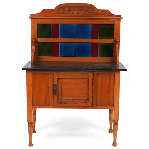 560 - Early 20th century walnut washstand with a tiled shelf back and black marble top, 128cm H x 92cm W x... 