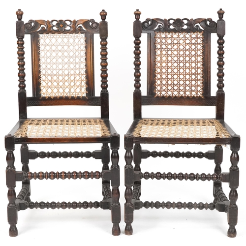 556 - Pair of George V oak side chairs with cane seats and backs, 96cm H x 50cm W x 46cm D