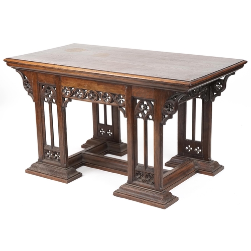 551 - Late Victorian Gothic Revival oak centre table, 80cm H x 144cm W x 75cm D