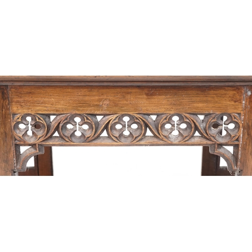 551 - Late Victorian Gothic Revival oak centre table, 80cm H x 144cm W x 75cm D