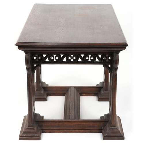 551 - Late Victorian Gothic Revival oak centre table, 80cm H x 144cm W x 75cm D