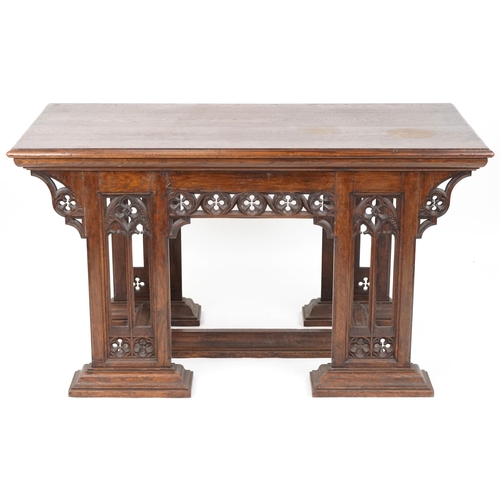 551 - Late Victorian Gothic Revival oak centre table, 80cm H x 144cm W x 75cm D