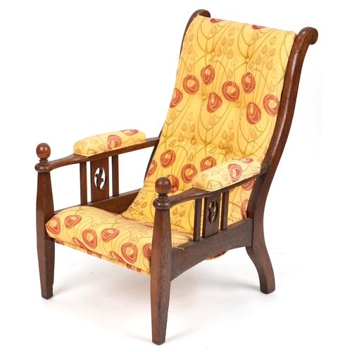 583 - Early 20th century Arts & Crafts oak armchair upholstered in floral fabric, 92cm H x 63cm W x 78cm D