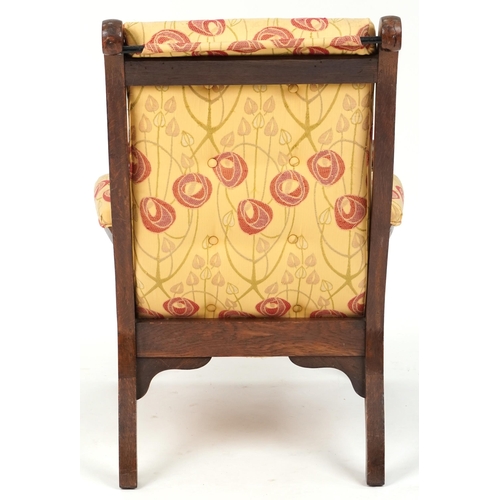 583 - Early 20th century Arts & Crafts oak armchair upholstered in floral fabric, 92cm H x 63cm W x 78cm D