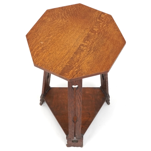 579 - Early 20th century Arts & Crafts oak octagonal two tier lamp table, possibly Glasgow School, 68cm H ... 