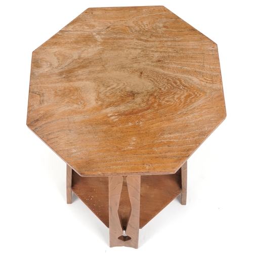 588 - Early 20th century Arts & Crafts oak octagonal lamp table, possibly Glasgow School, with pierced sup... 