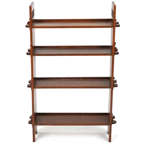 575 - Early 20th century Arts & Crafts oak four tier bookcase, 112cm H x 72cm W x 21cm D