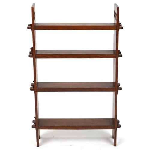 575 - Early 20th century Arts & Crafts oak four tier bookcase, 112cm H x 72cm W x 21cm D