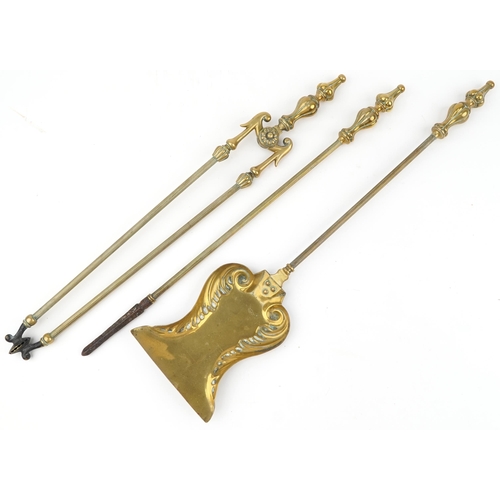 146 - Edwardian brass companion set to include shovel, tongs and poker, registration number 291355, the la... 