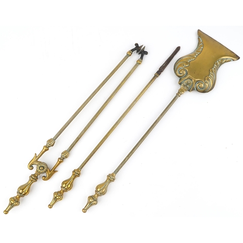 146 - Edwardian brass companion set to include shovel, tongs and poker, registration number 291355, the la... 