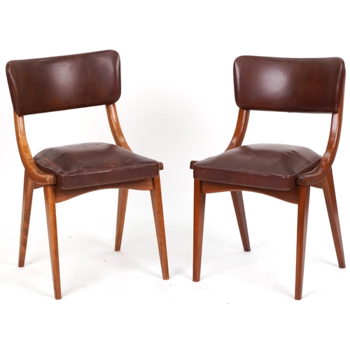 711 - Centa, two of Danish mid century teak chairs with brown faux leather upholstery, 80cm high