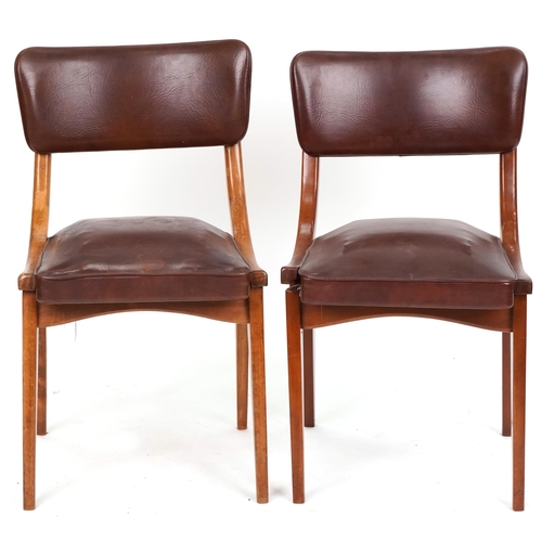 711 - Centa, two of Danish mid century teak chairs with brown faux leather upholstery, 80cm high