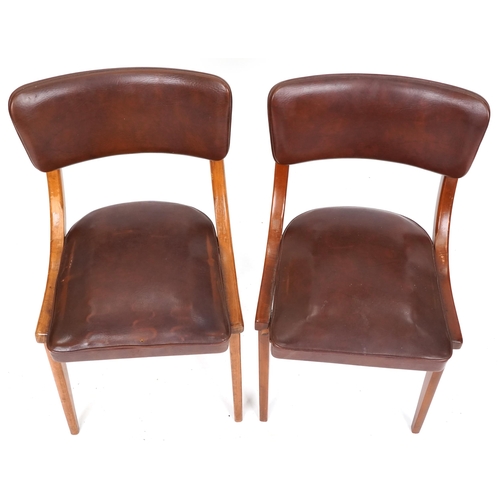 711 - Centa, two of Danish mid century teak chairs with brown faux leather upholstery, 80cm high