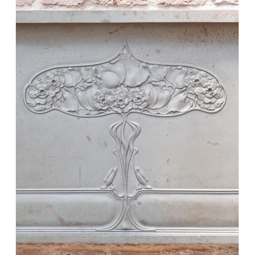 646 - Art Nouveau cast iron fire surround cast with stylized flowers, registration mark to the reverse, 13... 