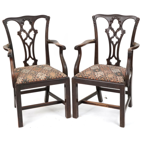 661 - Pair of late 19th/early 20th century mahogany framed scroll arm carver chairs with carved decoration... 