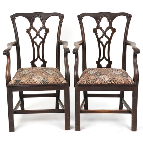 661 - Pair of late 19th/early 20th century mahogany framed scroll arm carver chairs with carved decoration... 