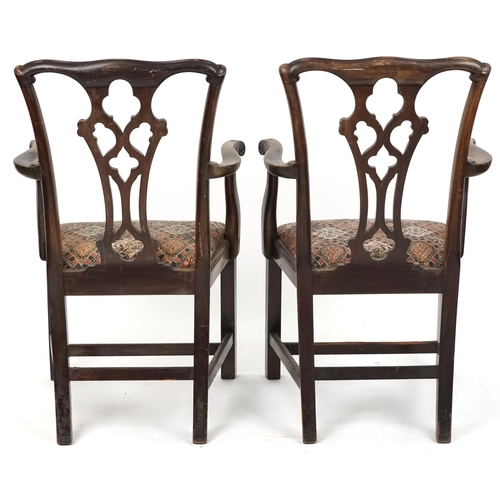 661 - Pair of late 19th/early 20th century mahogany framed scroll arm carver chairs with carved decoration... 