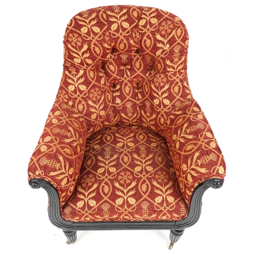 682 - Early Victorian scroll armchair, later ebonised, upholstered in red floral fabric