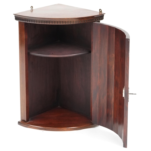 669 - Late 20th century hardwood bow front hanging corner cabinet, 66cm H x 46cm W x 36cm D