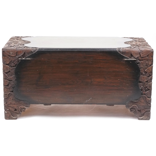 715 - Early 20th century Chinese camphor trunk with carved decoration, 50cm H x 101cm x 50cm D