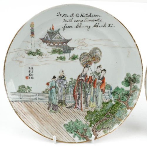 1019 - Pair of Chinese porcelain plates hand painted with ladies, inscribed to Mrs R. O. Hutchinson with co... 