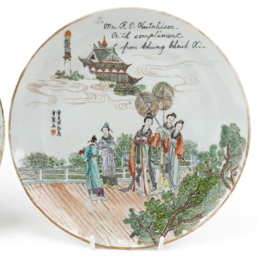 1019 - Pair of Chinese porcelain plates hand painted with ladies, inscribed to Mrs R. O. Hutchinson with co... 