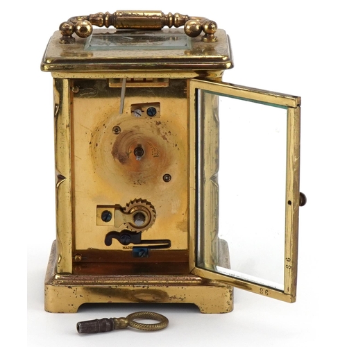 1194 - Brass carriage clock with enamel dial, 12cm high