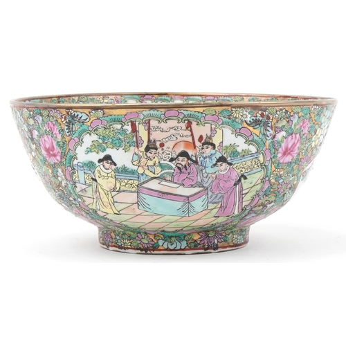 1358 - Large Chinese Famille Rose bowl decorated with flowers and courtier scenes, character mark to the ba... 