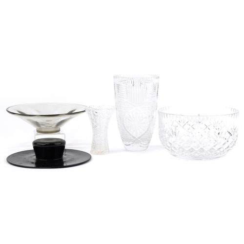 2309 - Large cut glass fruit bowl, vase, black glass posy ring, glass bowl and thistle cut vase, the larges... 