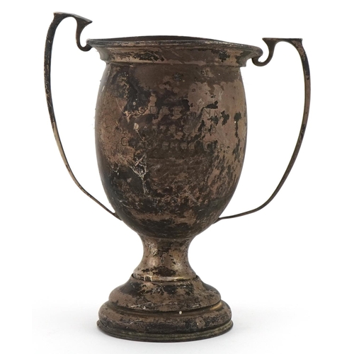 1135 - Broken silver twin handled trophy, indistinct hallmarks, 18cm high, 182.5g