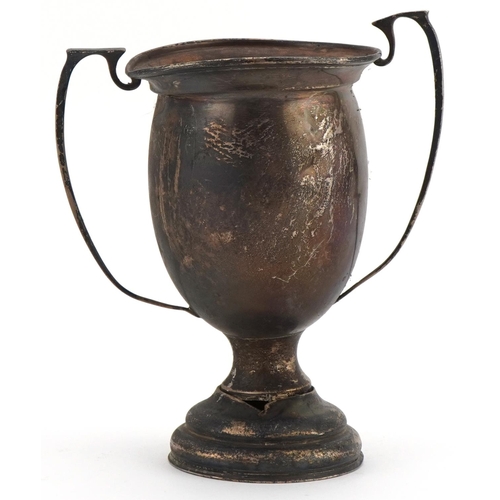 1135 - Broken silver twin handled trophy, indistinct hallmarks, 18cm high, 182.5g