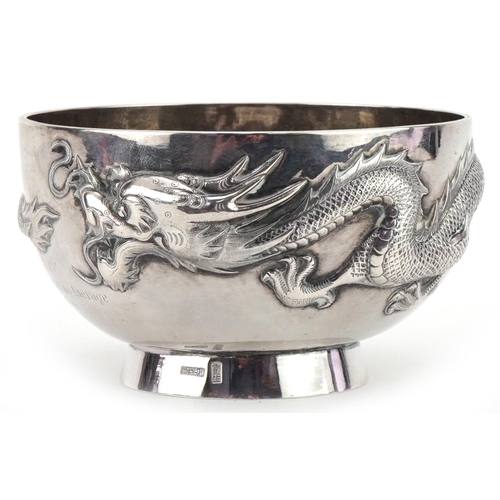 1020 - Wang Hing, Chinese export silver bowl embossed with a continuous dragon, 12.5cm in diameter, 228.5g